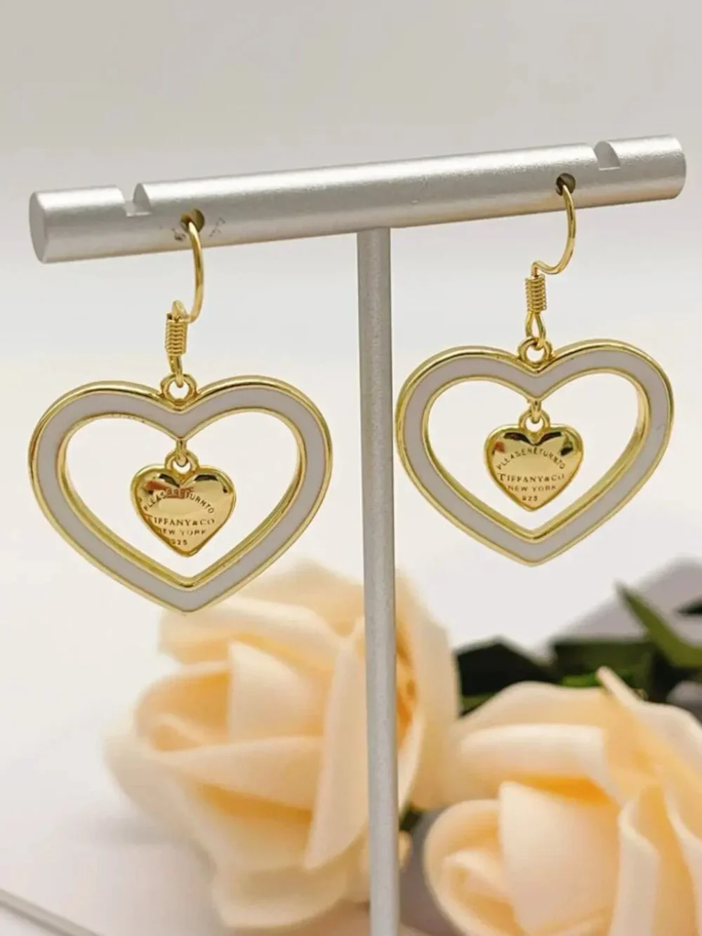 Tiffany & Co. Gold Tassel White Heart Earrings